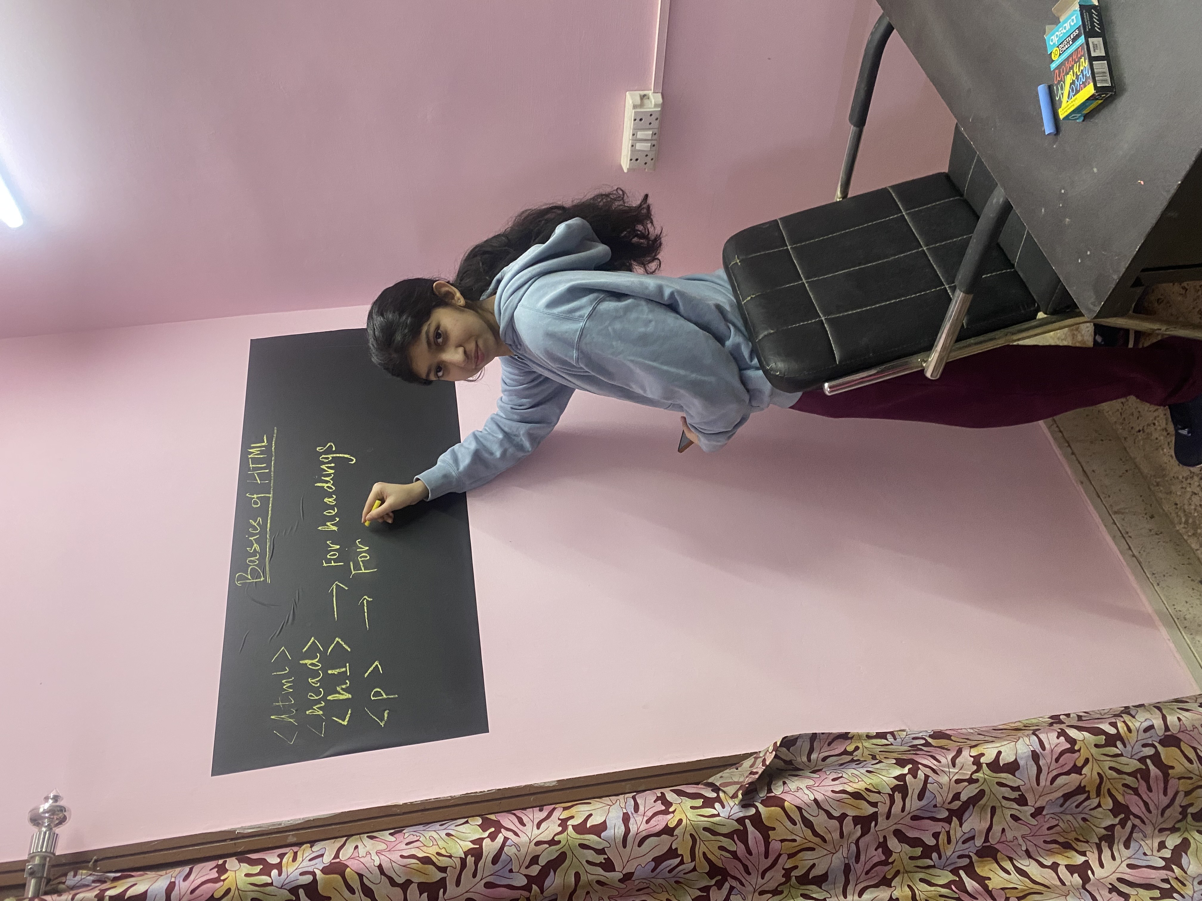 Founder Vibhuti at the blackboard