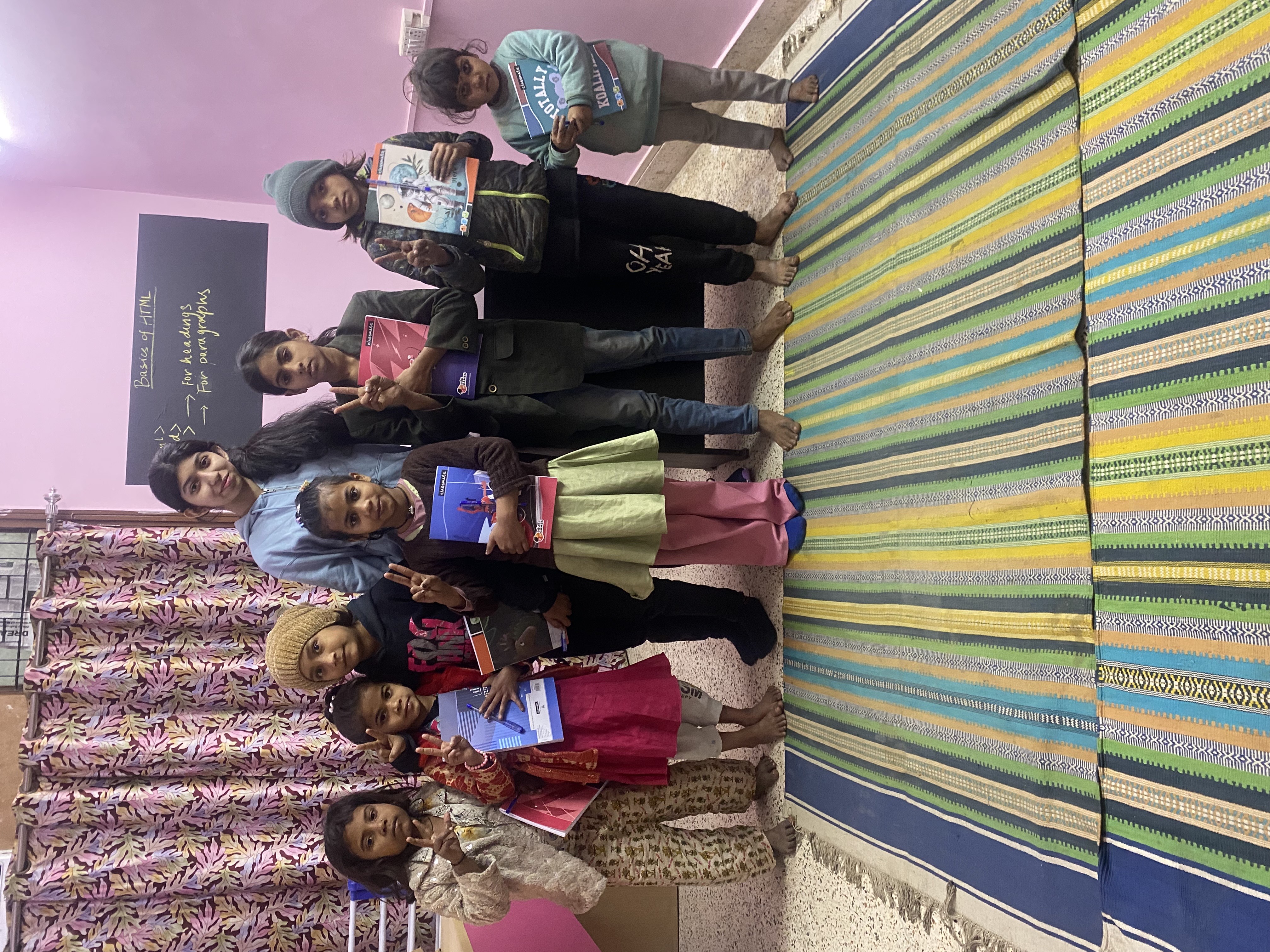 Group of smiling students with certificates